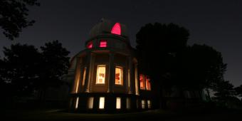 Observatory at night with dome open